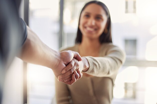 employee and boss handshake