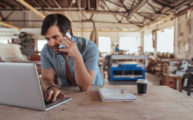 small business owner checking payment options