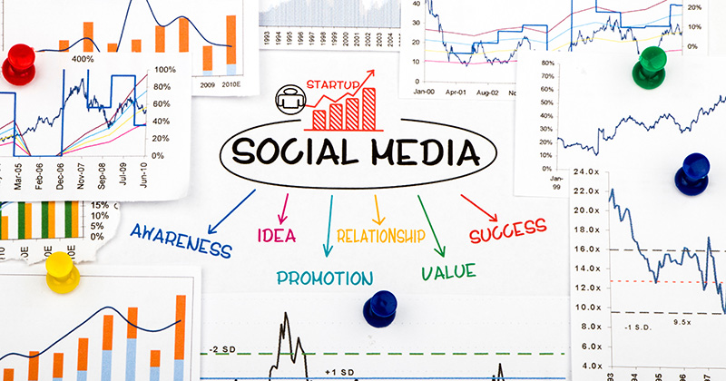 A graphic designed to look like a sketch pad. The main focus is the wors "digital marketing" written in black sharpie. There are doodles around it depicting business data.