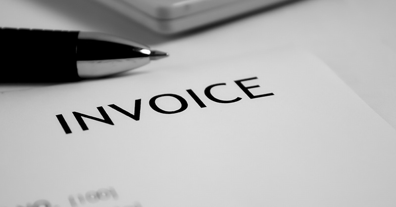 Document-with-the-word-_Invoice_-written-across-the-top.